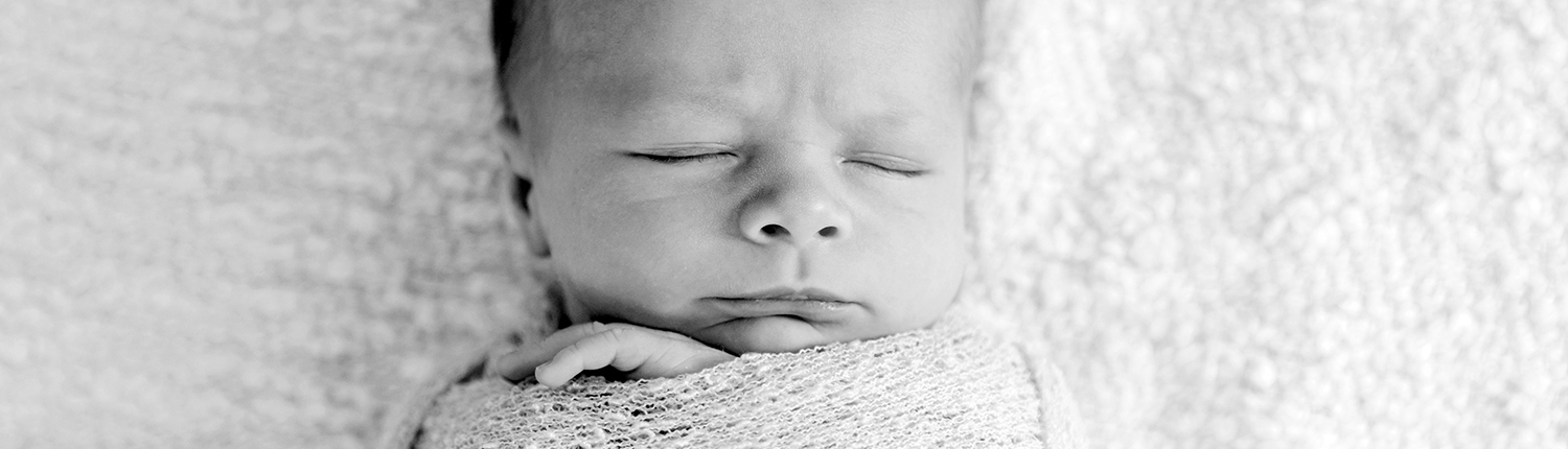 BW portrait of sleeping newborn