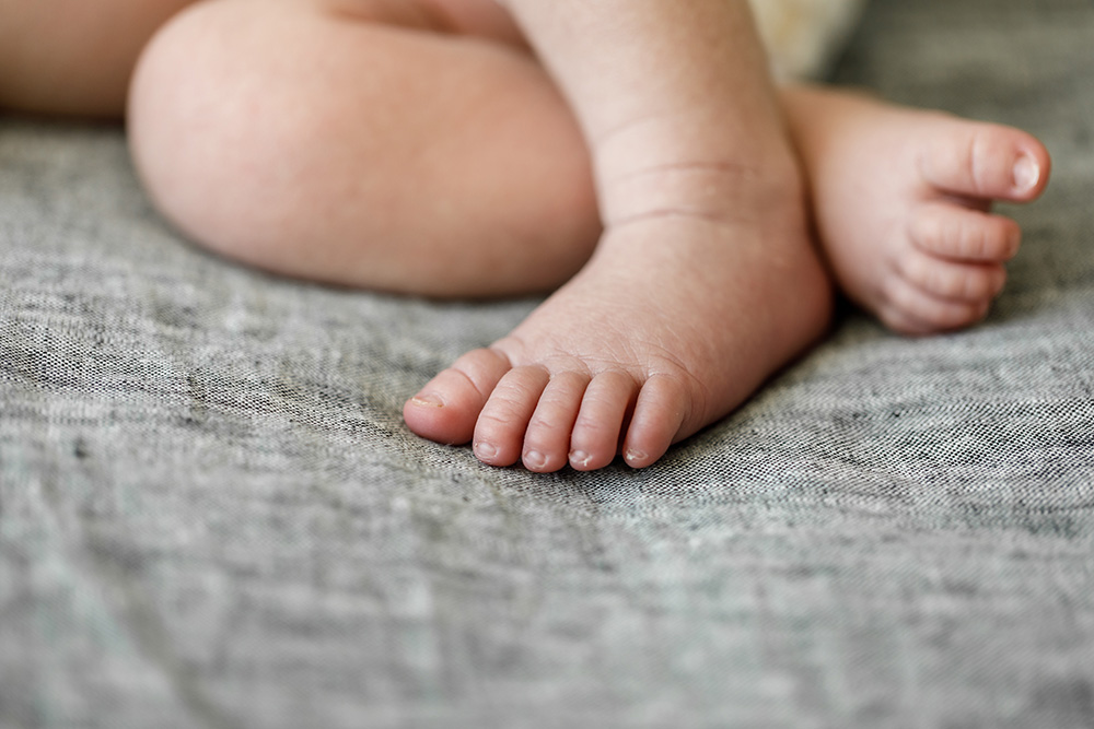 Newborn baby's feet close up