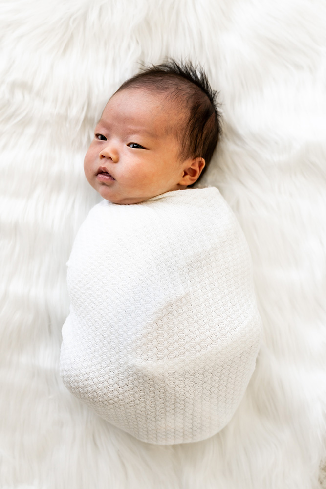 Asian newborn baby looking cute