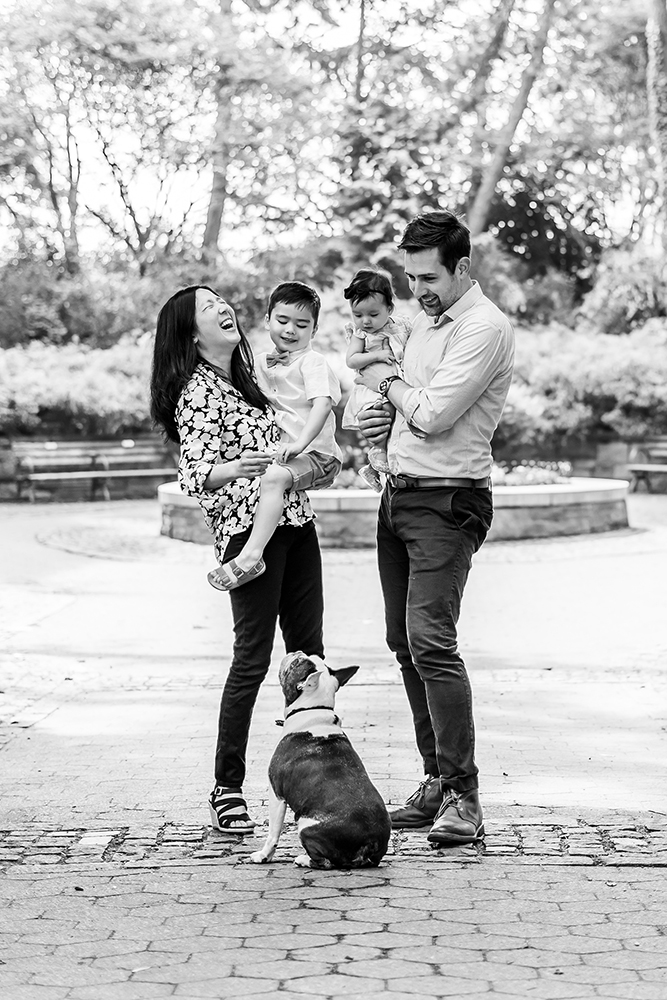black and white family photo with french bulldog