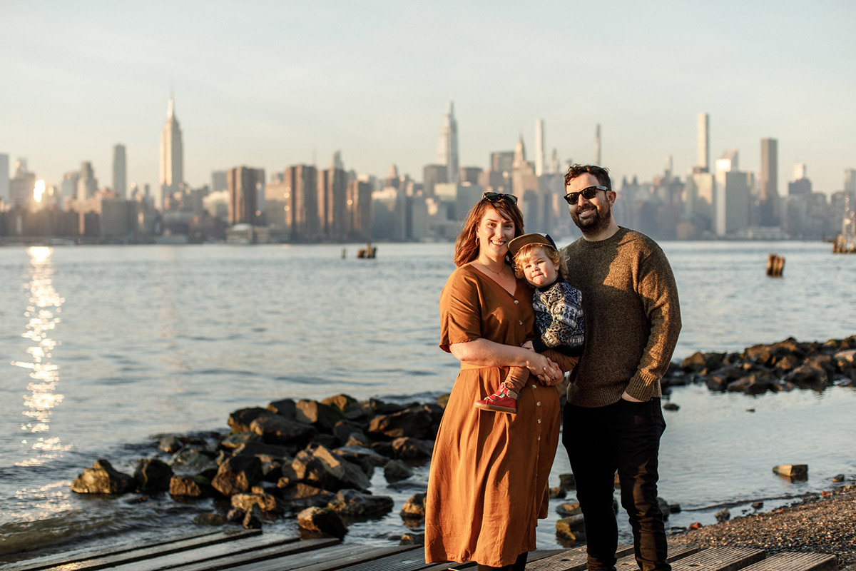 family photo in dumbo with nyc skyline