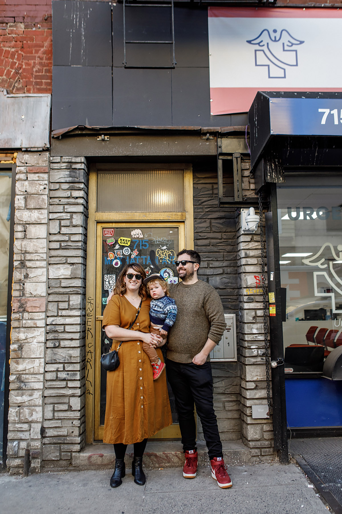 family photo in front of a house in brooklyn