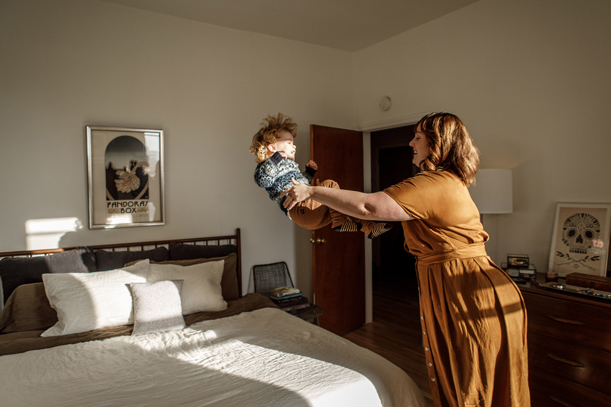 mom playing with her son in a beautiful brooklyn apartment