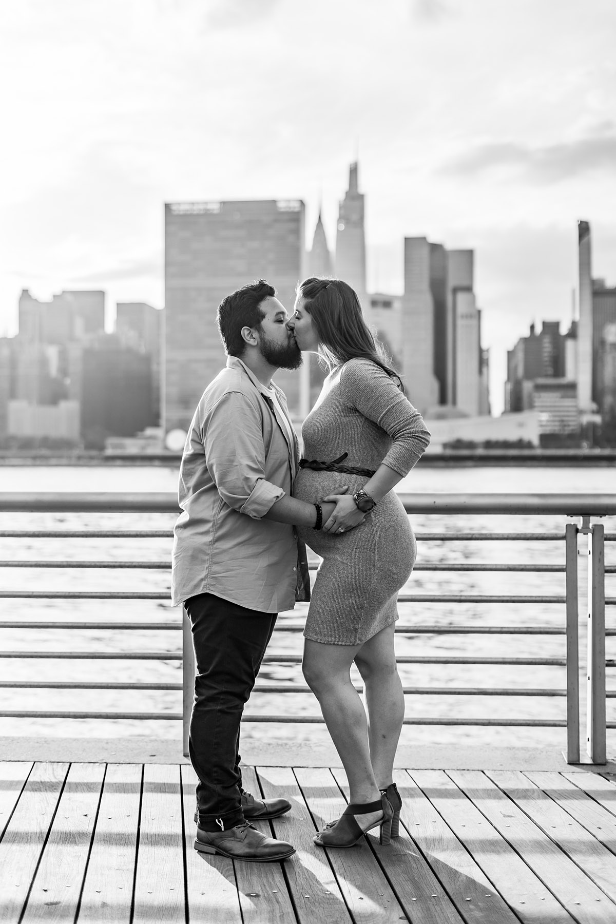 BW shot of pregnant couple in hoboken