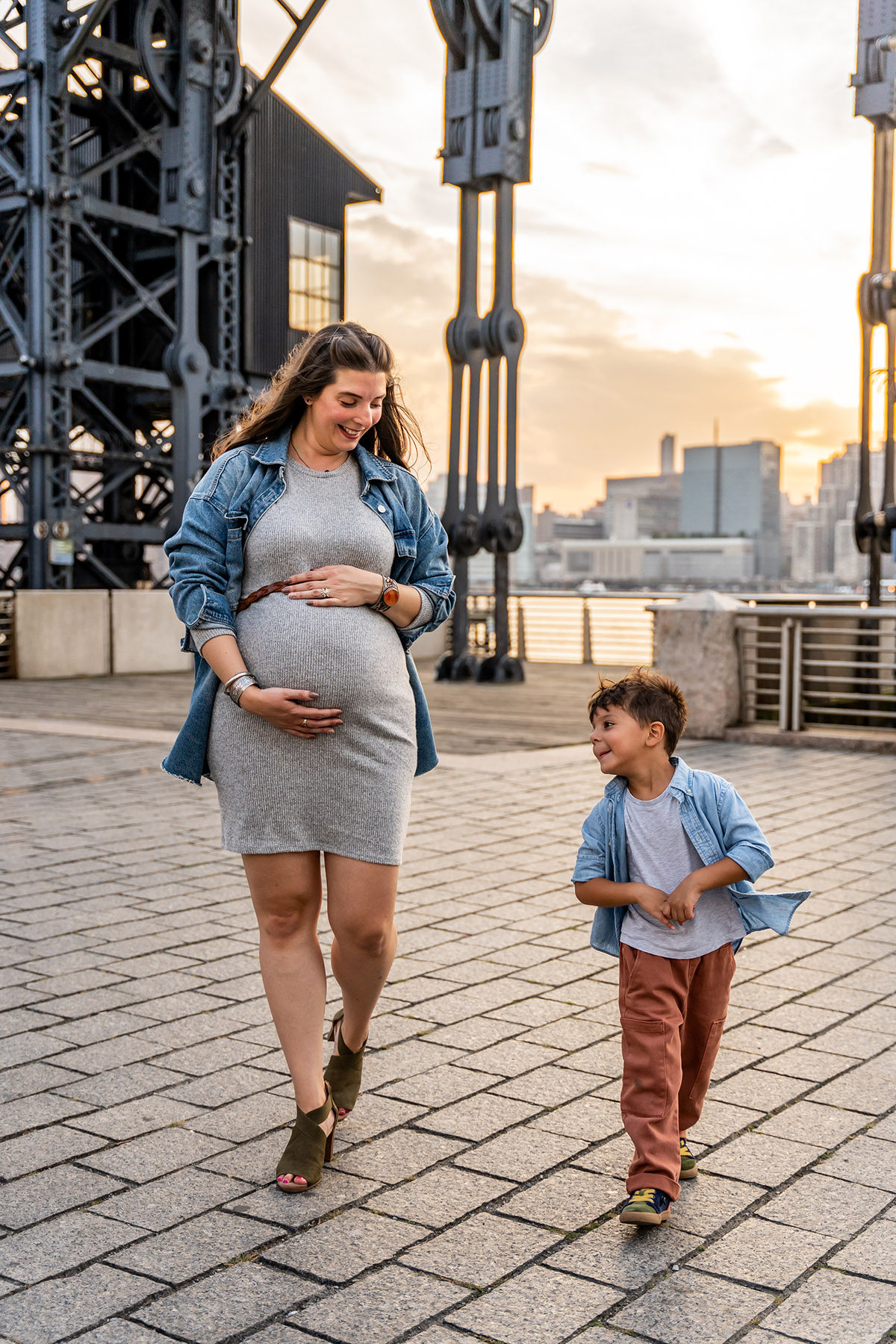 pregnant mom with her son walking around queens