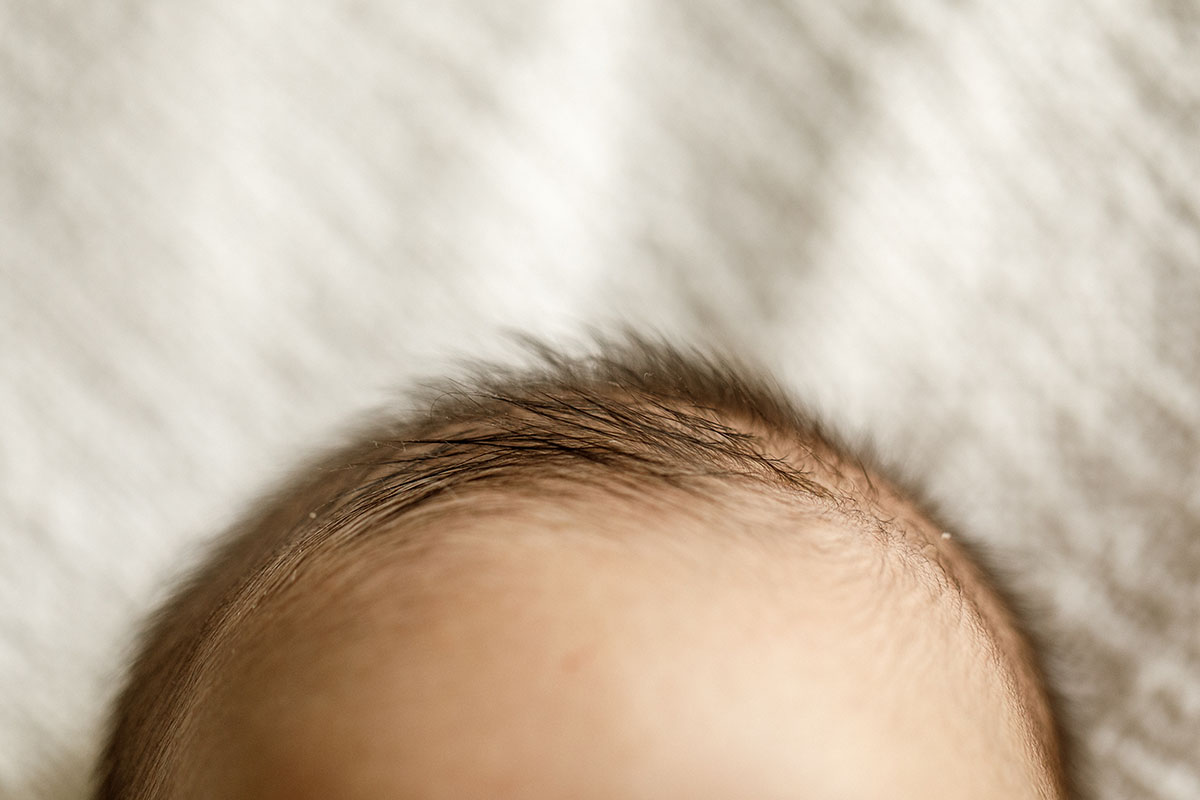 newborn baby hair and forehead beige colors