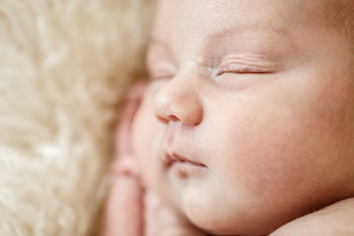 Close up of newborn baby face