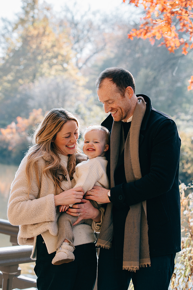 Family of three in Central Park in a Fall Mood