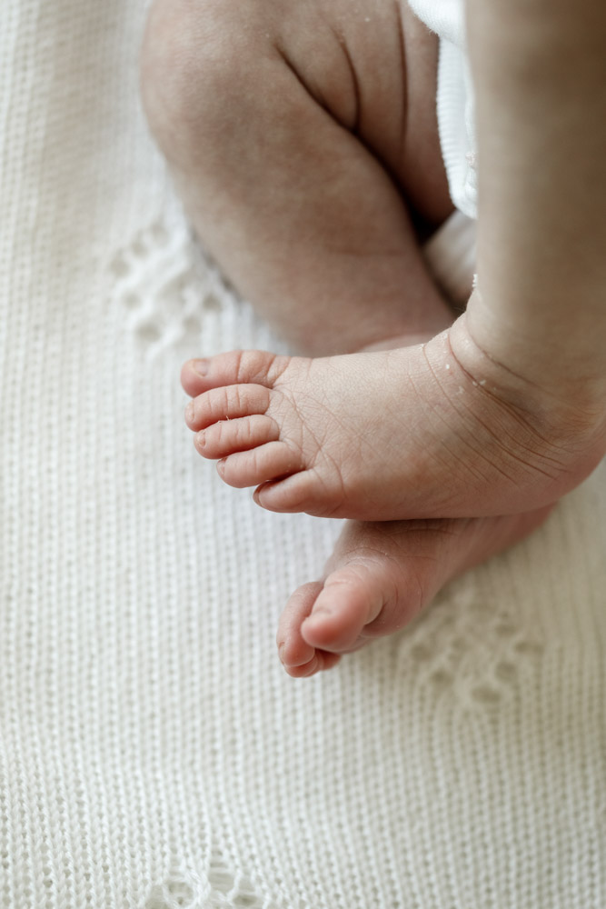 close up of crossed baby feet