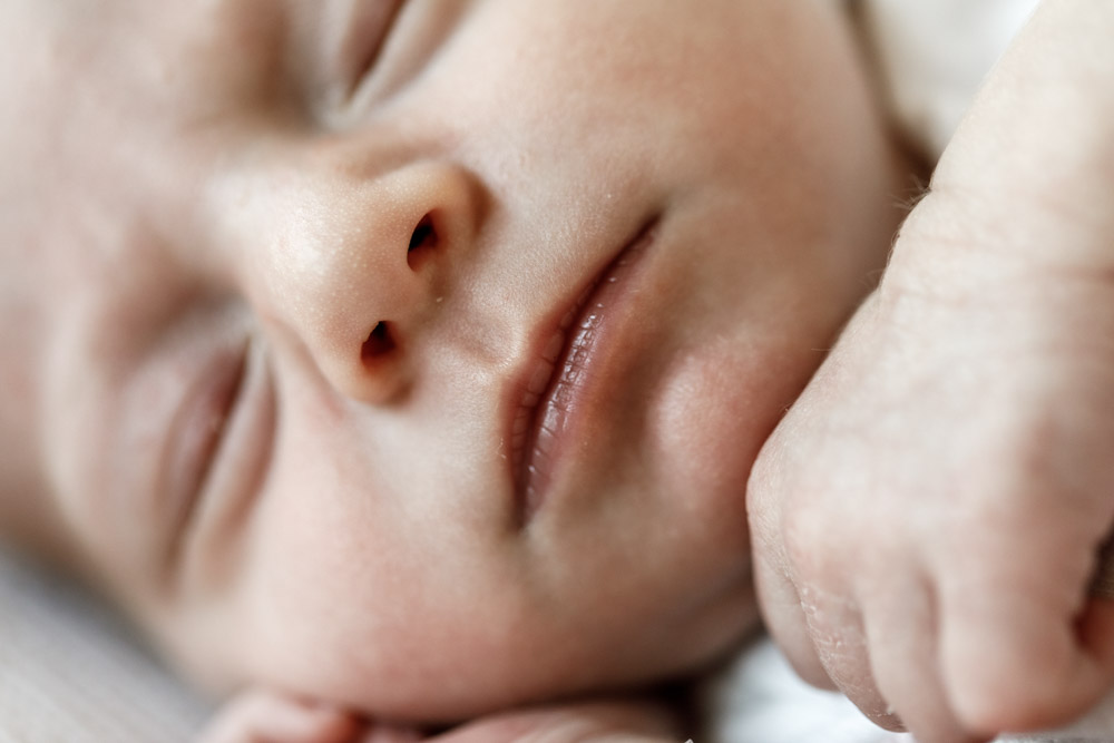 close up of a newborn baby's face