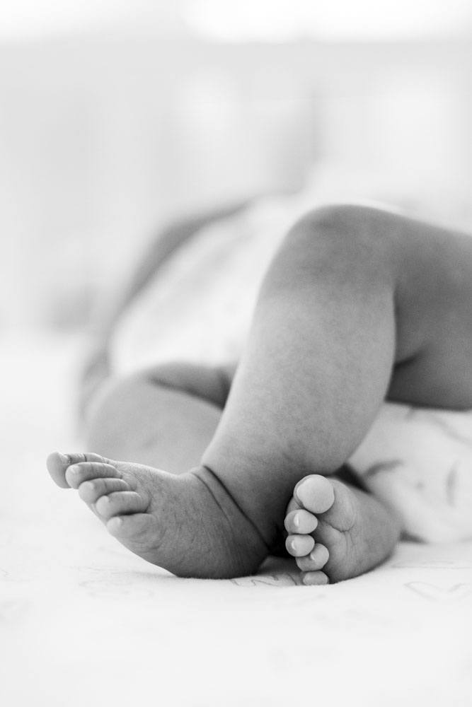 Baby Photography, black and white photo of cute little crossed baby feet