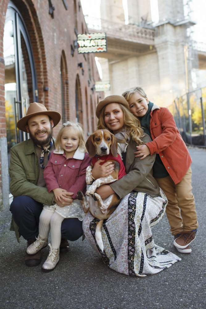 Family Session, family of four and their dog in the streets of Brooklyn smiling at the camera