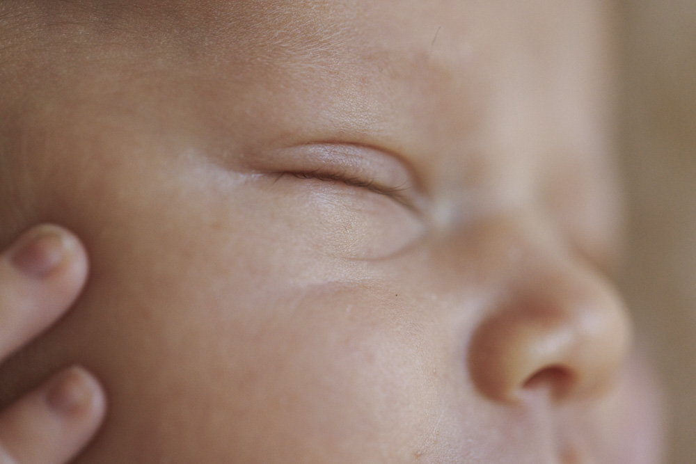 Baby Photography, close up of a sleeping newborn baby's face